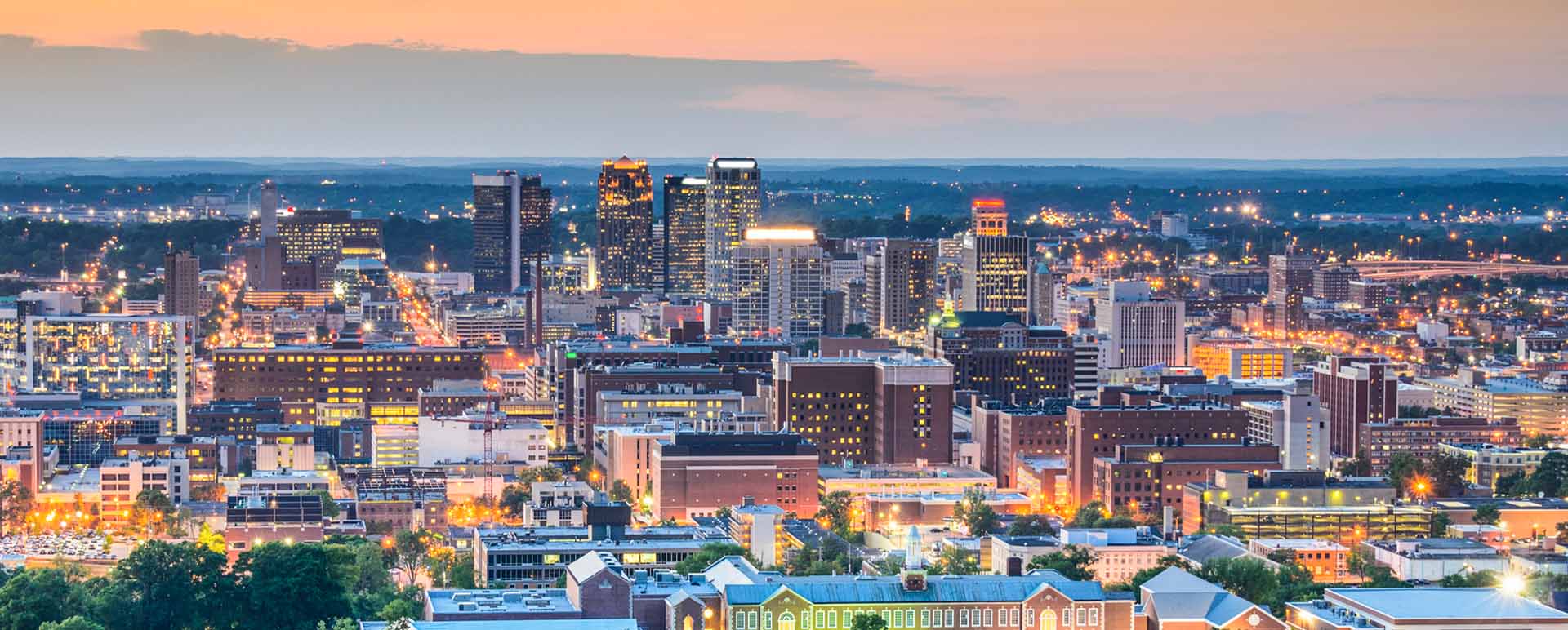 Neon color image of a band playing and people singing along